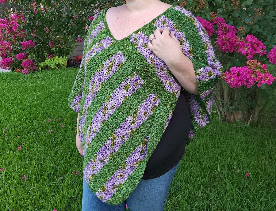 
            
                Load image into Gallery viewer, Blooming Flowers Poncho Crochet Pattern
            
        